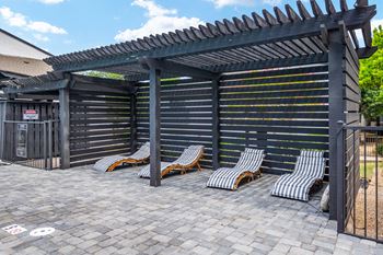 Resort-style pool with lounge seating
